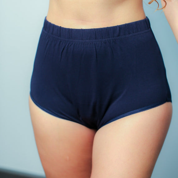 Navy absorbant underwear worn by woman